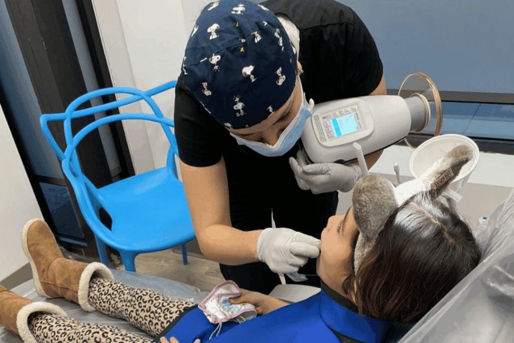 Pediatric Dentist Examining A Child’s Cracked Tooth