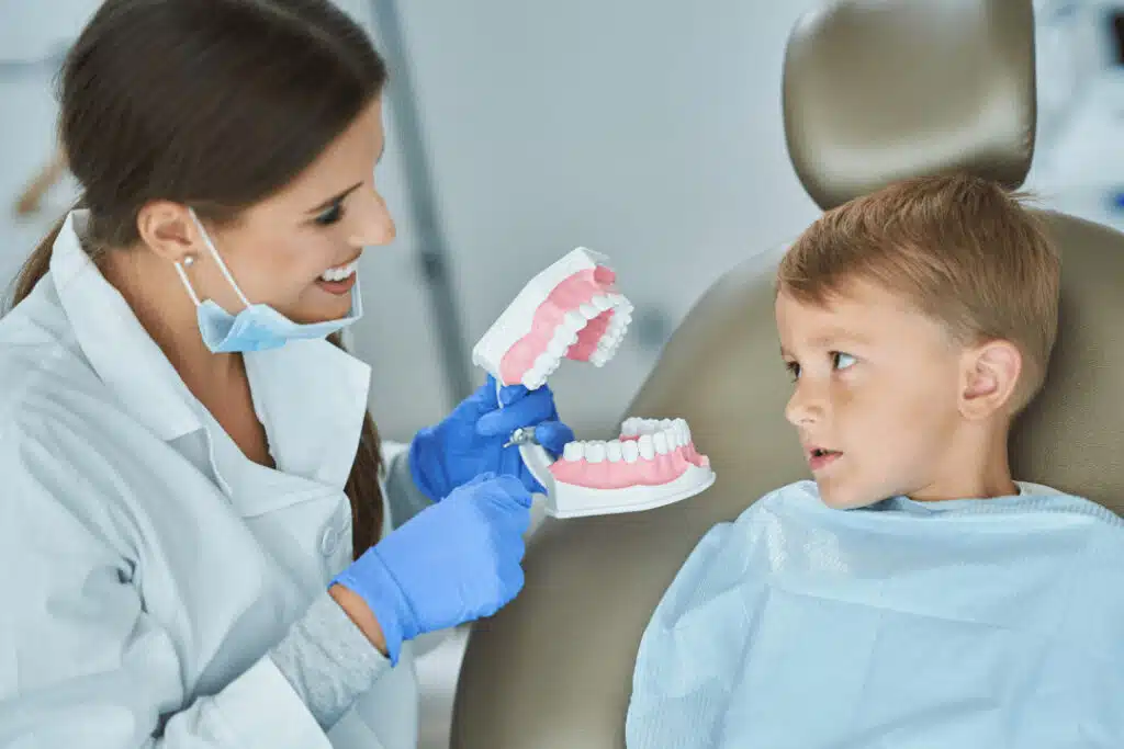 Pediatric Dentist With Patient